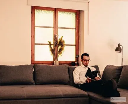 What furniture pieces best define living room zones